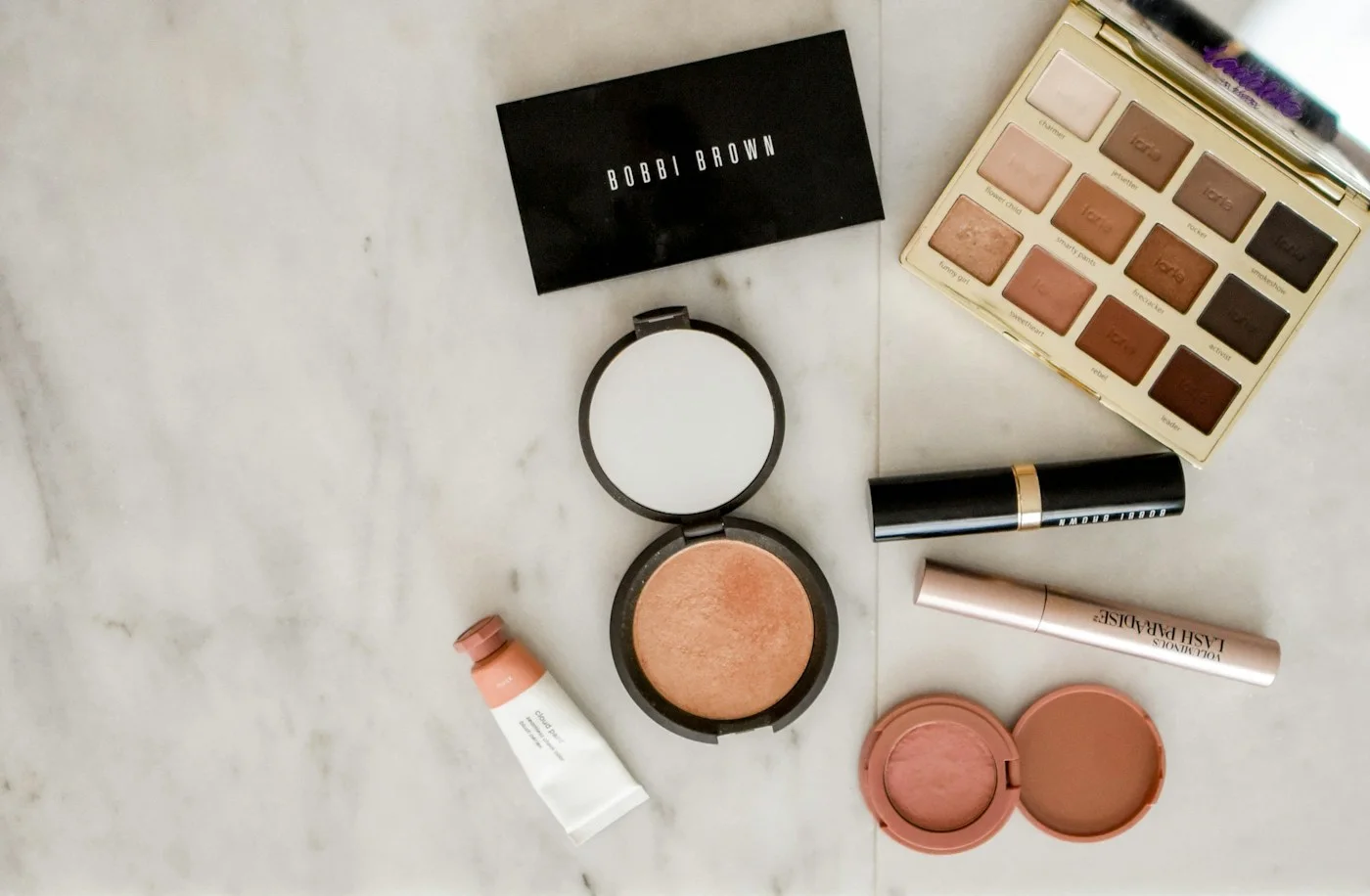 Beauty tools and makeup on a dressing table