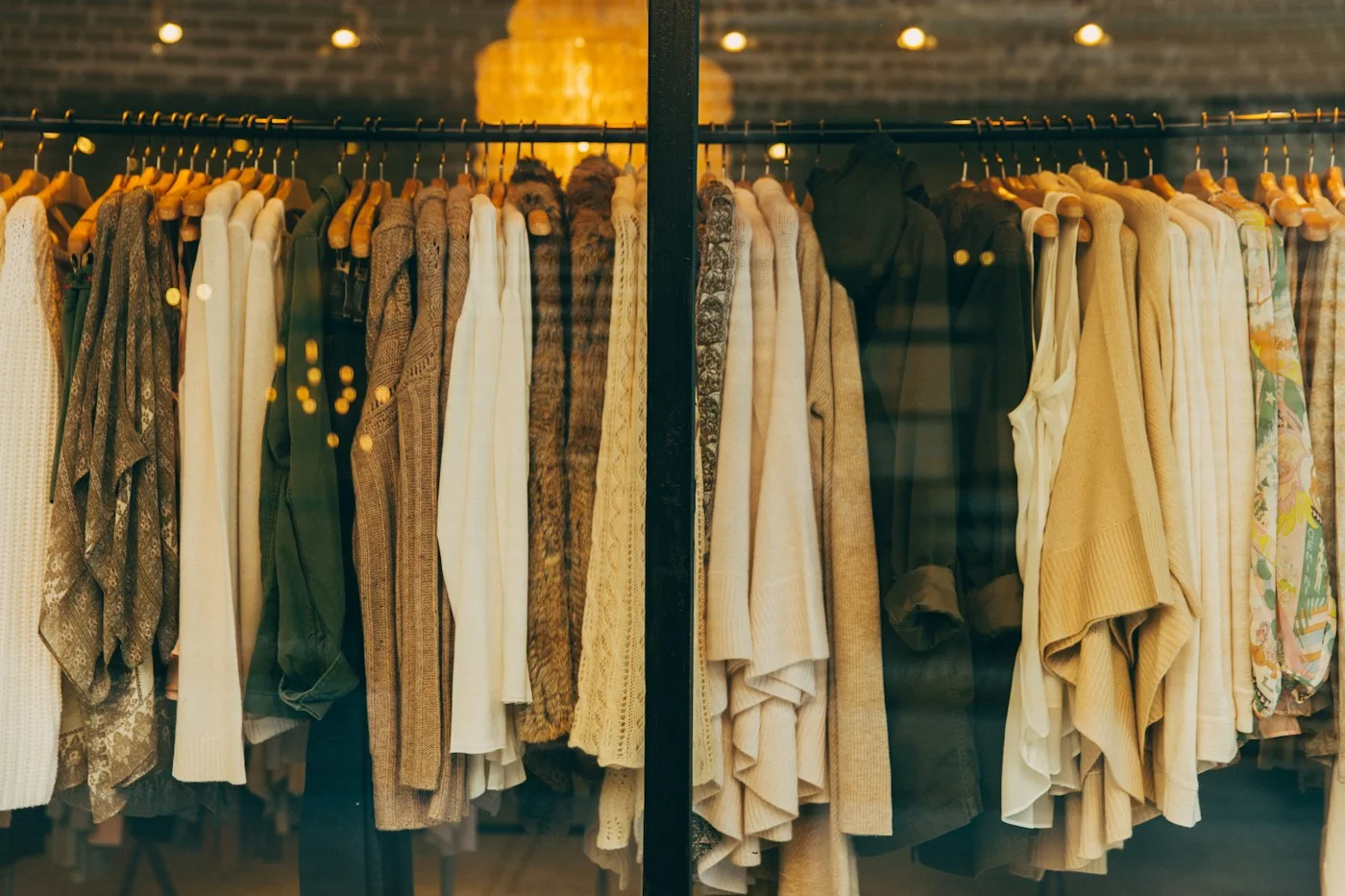 Everyday garments hanging on a clothing rail
